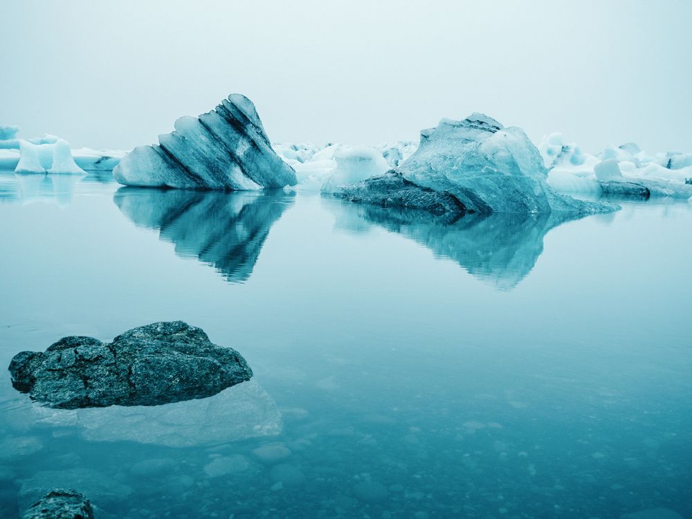 Ice on water between snow