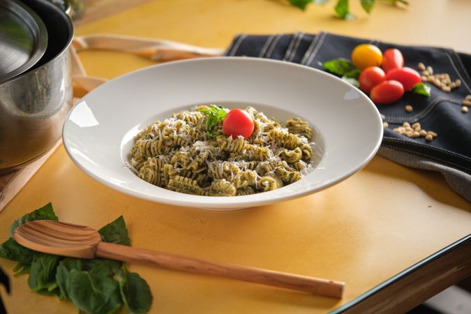 Tasty Fusilli with cheese on plate