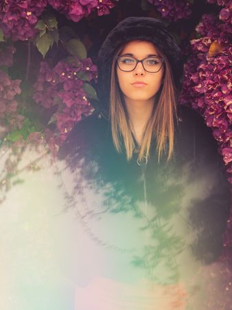 Woman on background of stunning violet flowers
