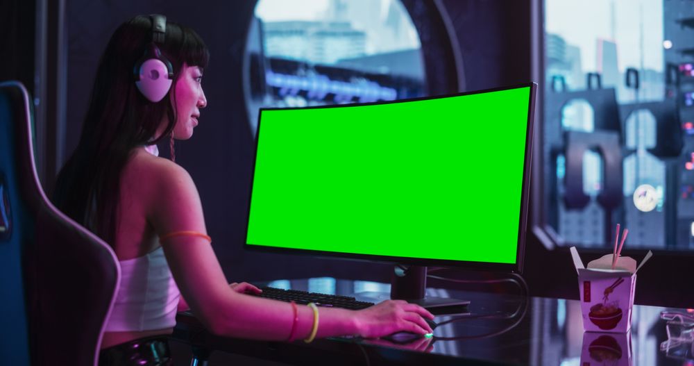 Young Female Focused on a Online Match in a Futuristic Neon Room