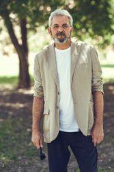 Portrait of a mature man standing in a park