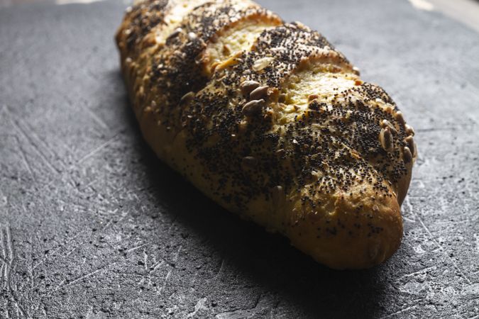 Loaf of bread with grains and poppy seeds