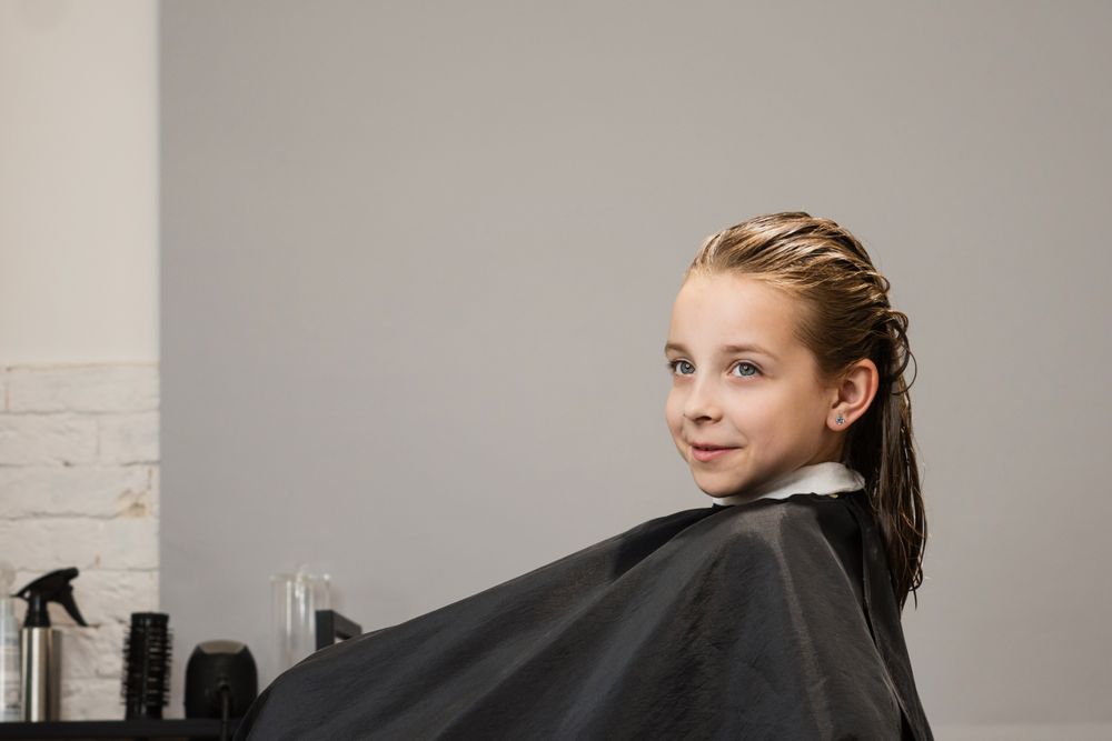 Child before haircut in beauty salon
