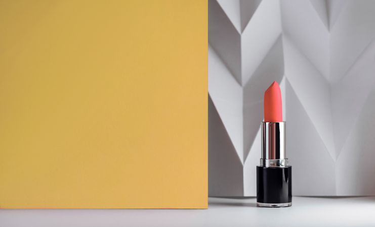 Red lipstick on raised chevron, Product and make up contemporary concept