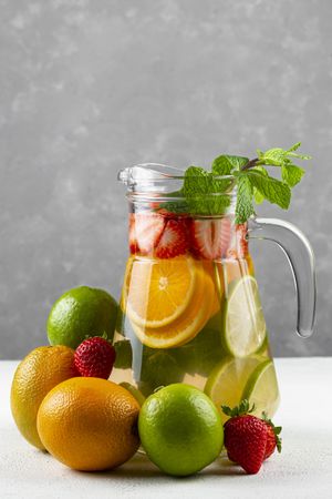 Water flavored with fresh summer fruit.