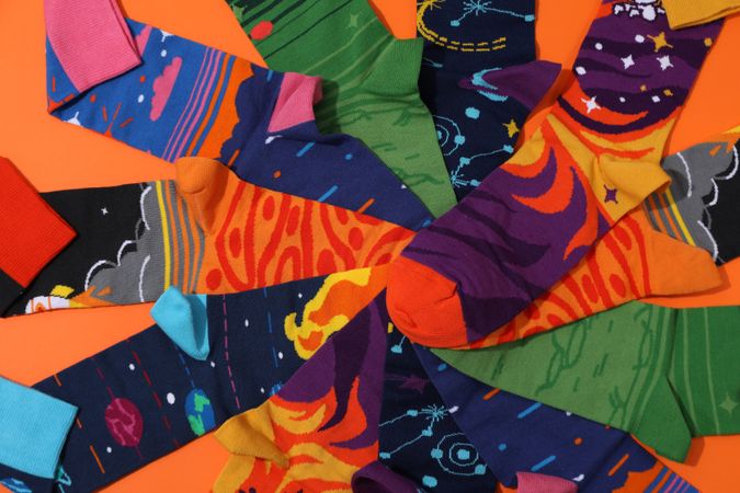 Casual clothes and wearing concept - socks, clothes for foot