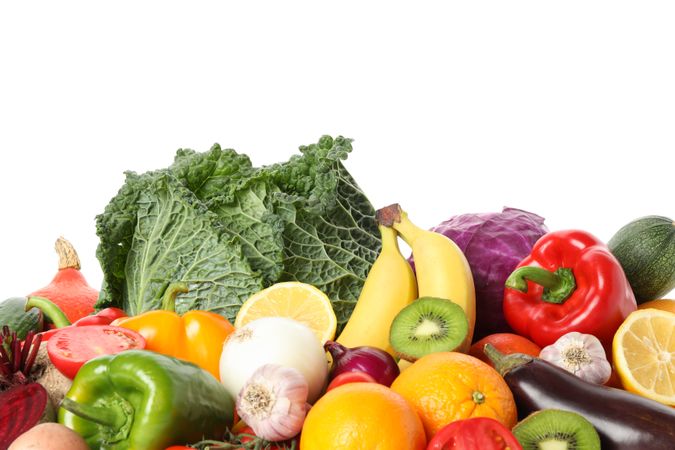 Pile of fresh vegetables and fruits isolated on plain background