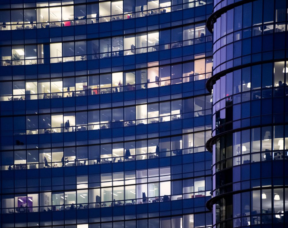 Lit commercial building at night