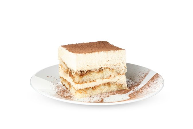 Sweet tiramisu isolated on light background. Tasty dessert