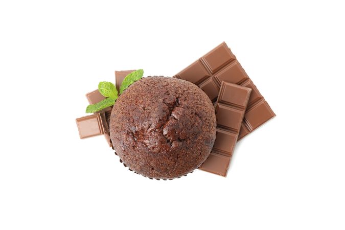 Delicious chocolate and muffin isolated on plain background