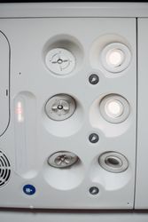 aircraft ceiling compartment with different buttons