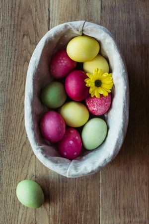 Flowers and Easter eggs on table