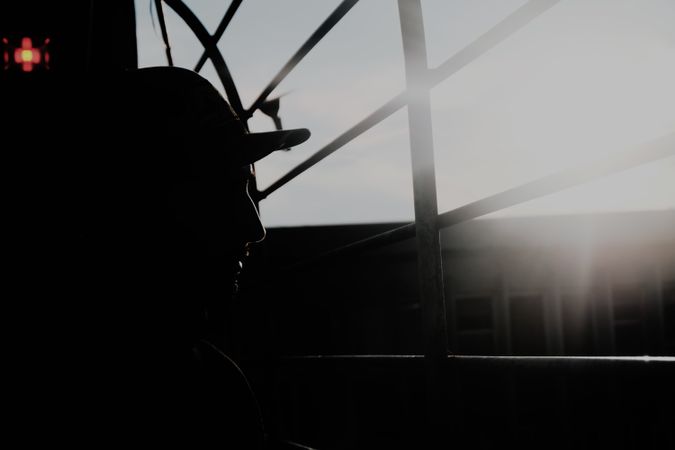 Modern man inside desolate building