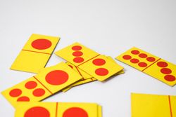 Domino cards scattered on table