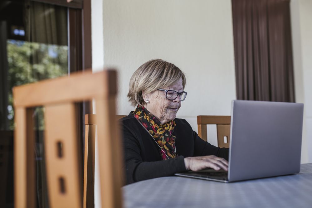 Mature woman using laptop