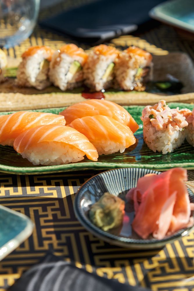 Delicious sushi rolls on plate