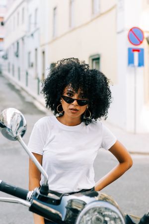 Stylish Black female on motorbike