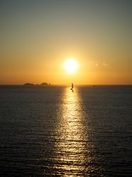 Sailboat silhouette during sunset