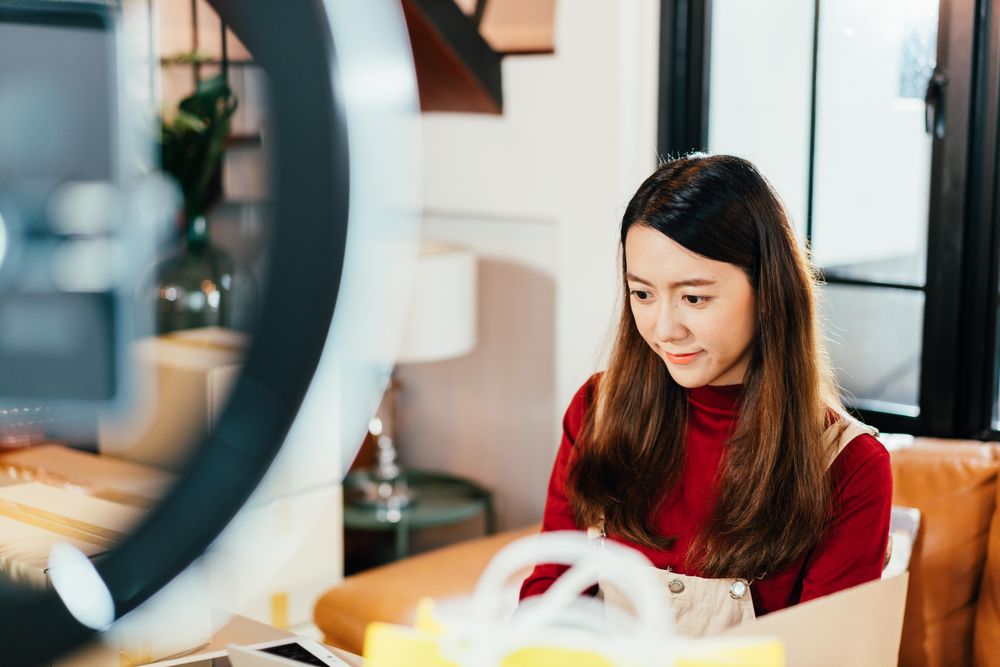 Woman working on her e-commerse business from home