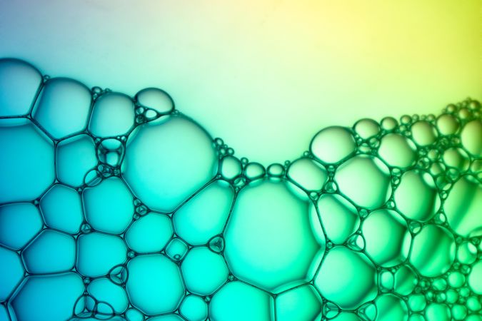 Abstract background bio technology, macro photography foam and water with gradient background. Molecule multicolor backgorund