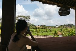 Woman Taking Photos With Mobile Phone