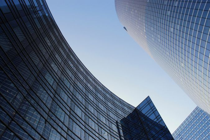 Modern Skyscraper Architecture with Glass Facades Against Blue Sky