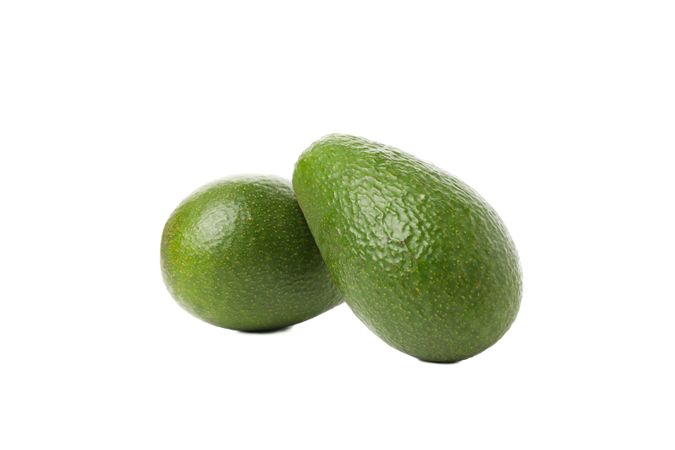 Ripe fresh avocado isolated on plain background