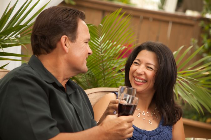Laughing Couple Drinking Wine