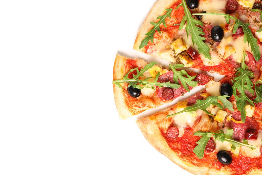 Meat pizza with arugula isolated on blank background, top view