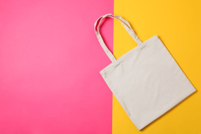 Eco bag on two color background, space for text