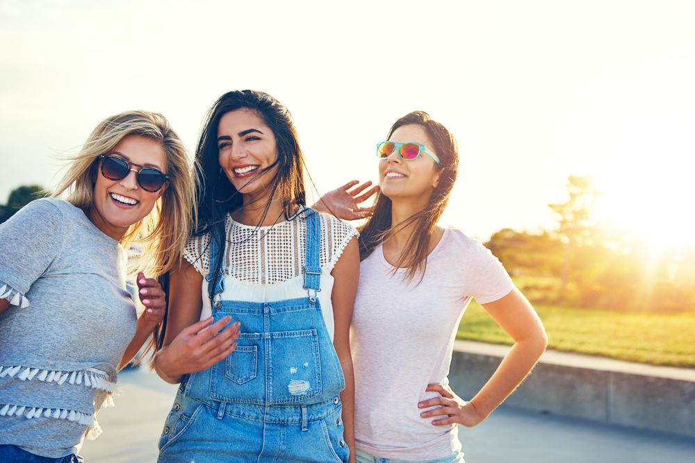 Happy female friends in the sun