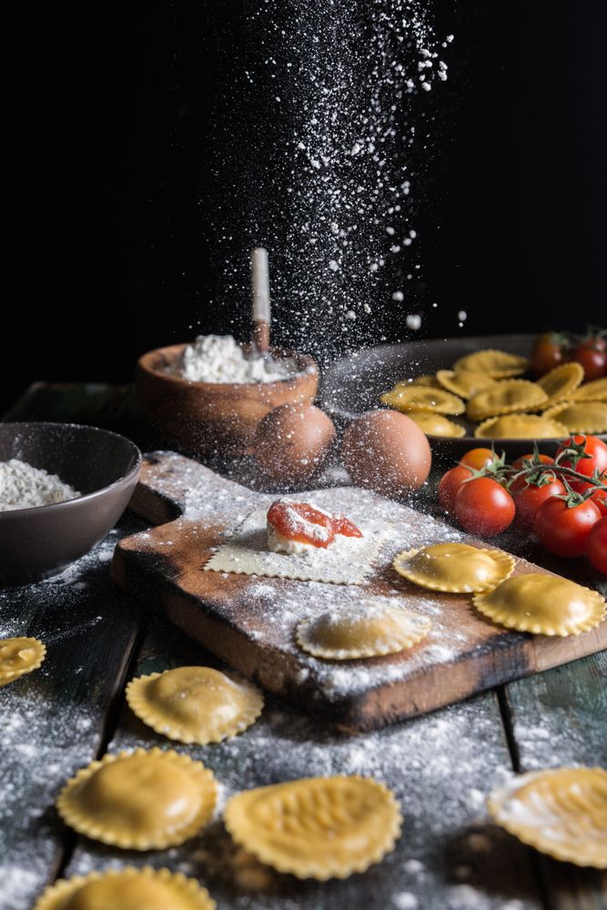 Homemade ravioli made with parmesan cheese, tomato and basil.