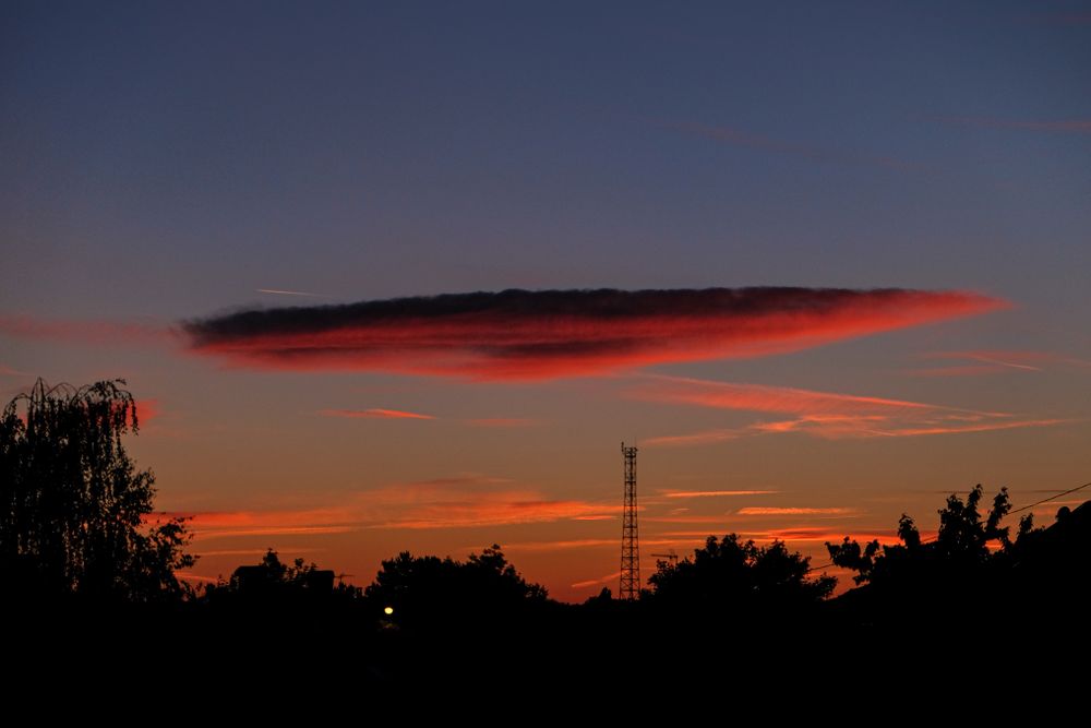 Red sunrise with ominous cloud