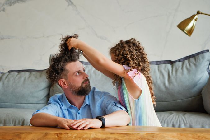 Dad and daughter at home