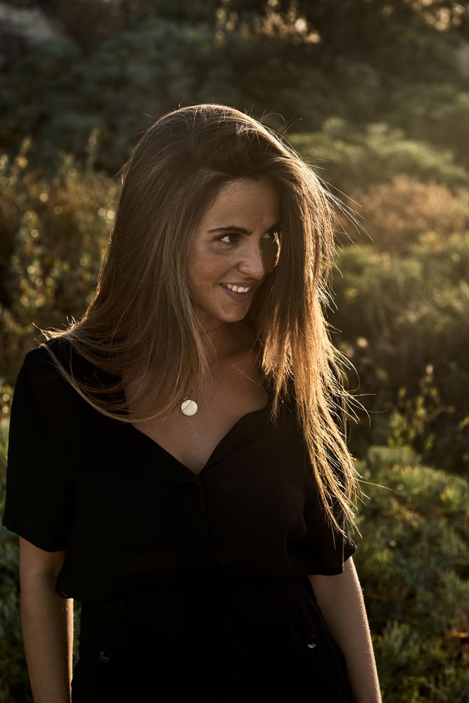 Cheerful woman looking away