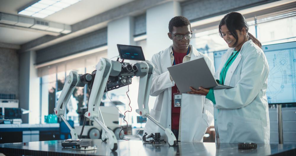Two Multiethnic Engineers Brainstorming, Discussing Futuristic AI Pet