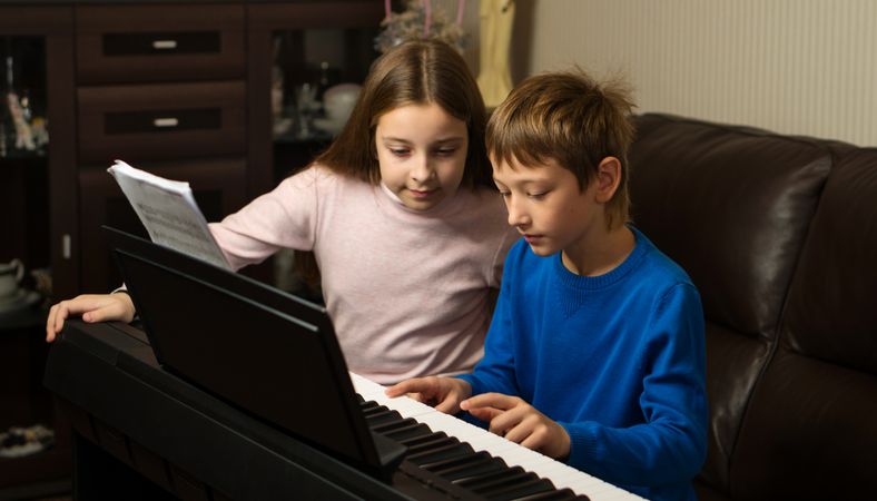 Siblings' Piano Practice Time