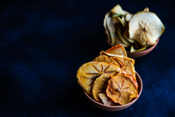 Bowls of dried persimmon slices