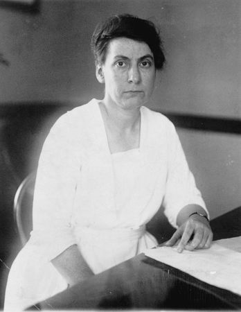 Portrait of Grace Abbott (1878 – 1939) at desk
