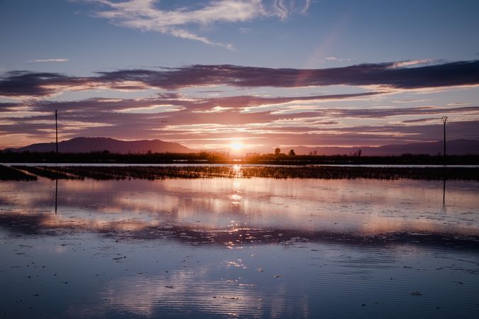 Beautiful sunset over river delta