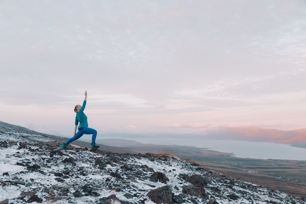 Woman posing on hill in snow