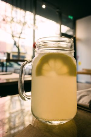 Glass cups with tasty lemonade
