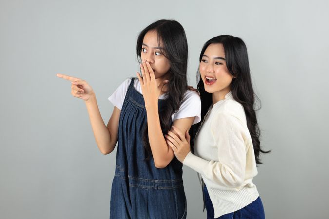 Two Young Asian Friends Happy Surprised Face