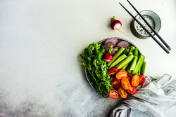 Healthy vegetable bowl in daylight with copy space