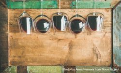Glasses of red wine glasses laying on wooden background, with copy space 4d3yD5