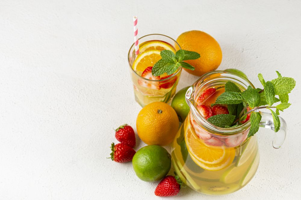 Water flavored with fresh summer fruit.