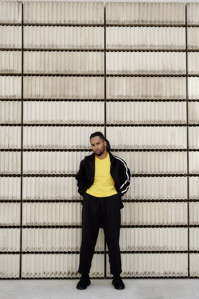 Black male near concrete blocks