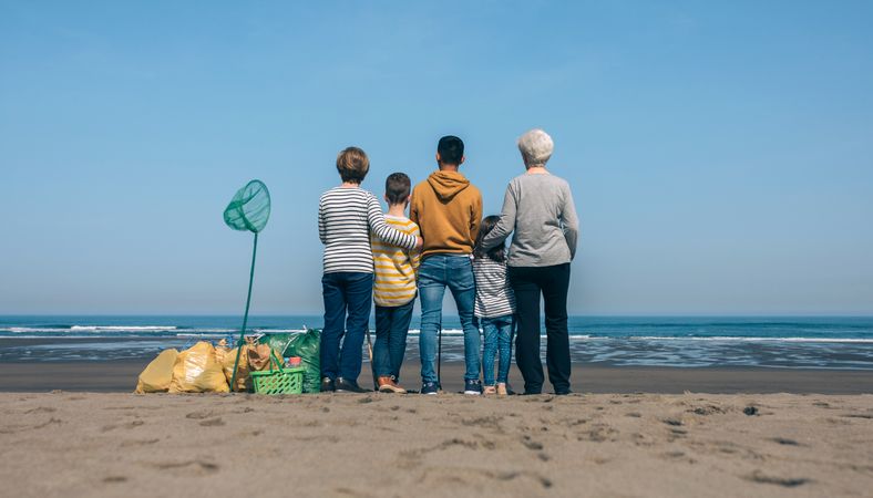 Volunteers backwards watching the sea
