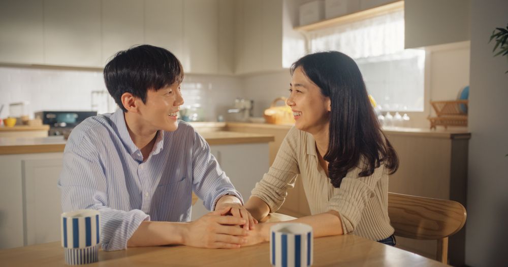 Boyfriend and Girlfriend Having Fun Conversations in the Kitchen.