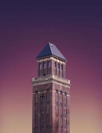 Clock tower against a gradient purple sky